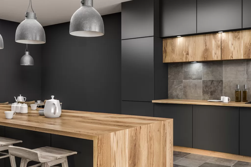 Corner of modern kitchen interior with gray walls, tiled floor, gray countertops and wooden bar with stools. 3d rendering