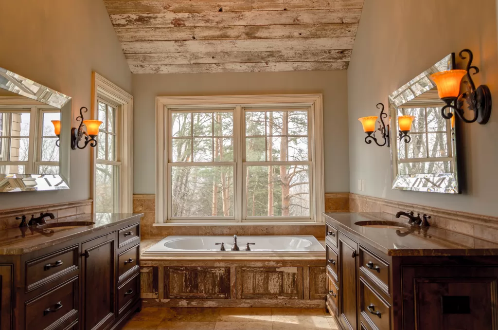A wonderful classical bathroom with wooden furniture and beautiful lighting