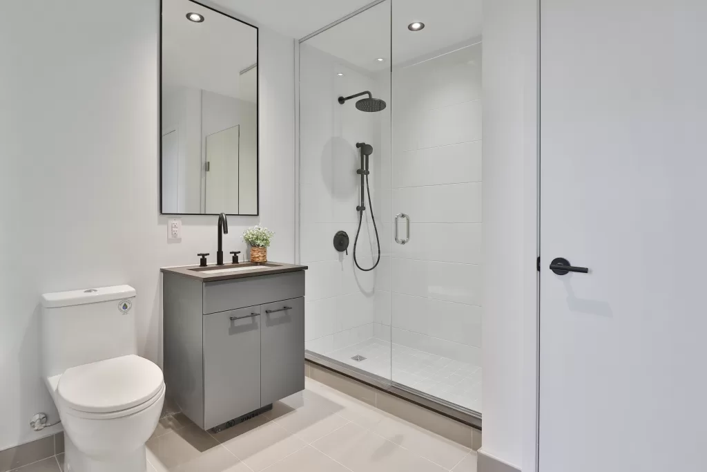 Minimalist bathroom in white tones with a minimum of furniture
