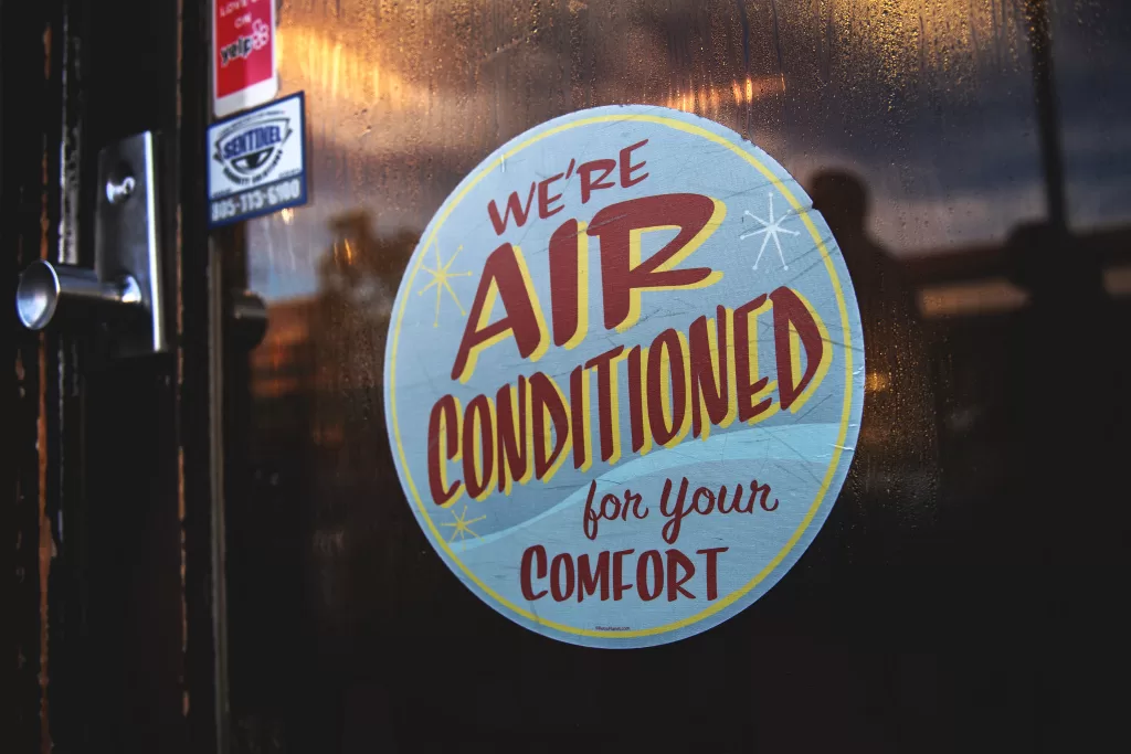 A sign on the door of a company specializing in air conditioner installations