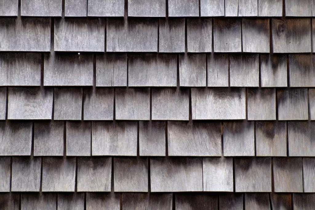 Wood shingles in a medium wood shade that a local roofing company can install