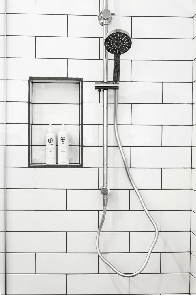 beautiful newly installed shower against the backdrop of tiles